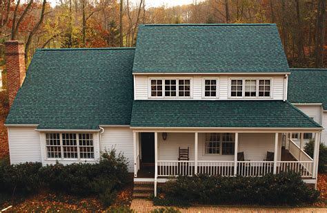 white house with green metal roof|hunter green roof color scheme.